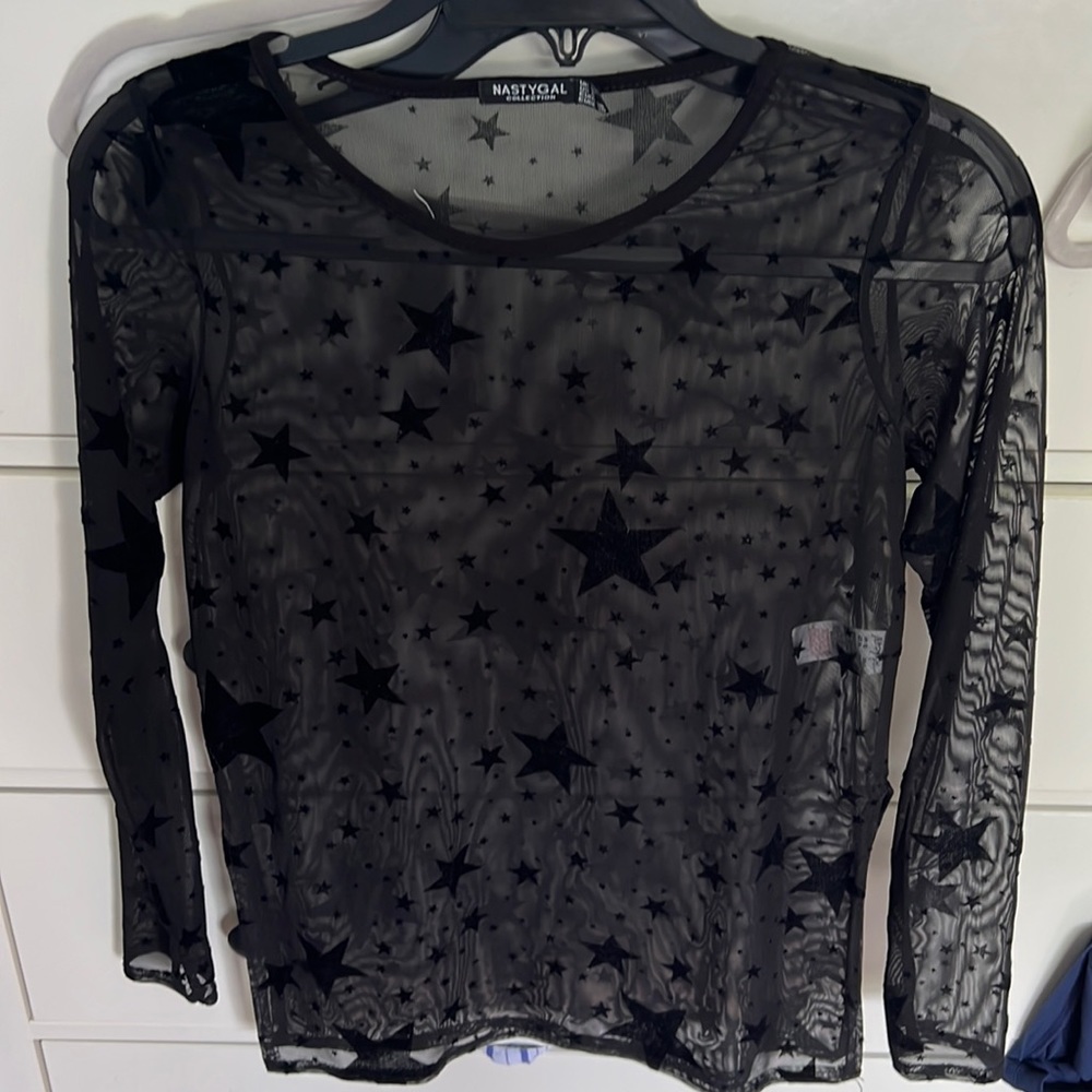 Sheer black top with stars